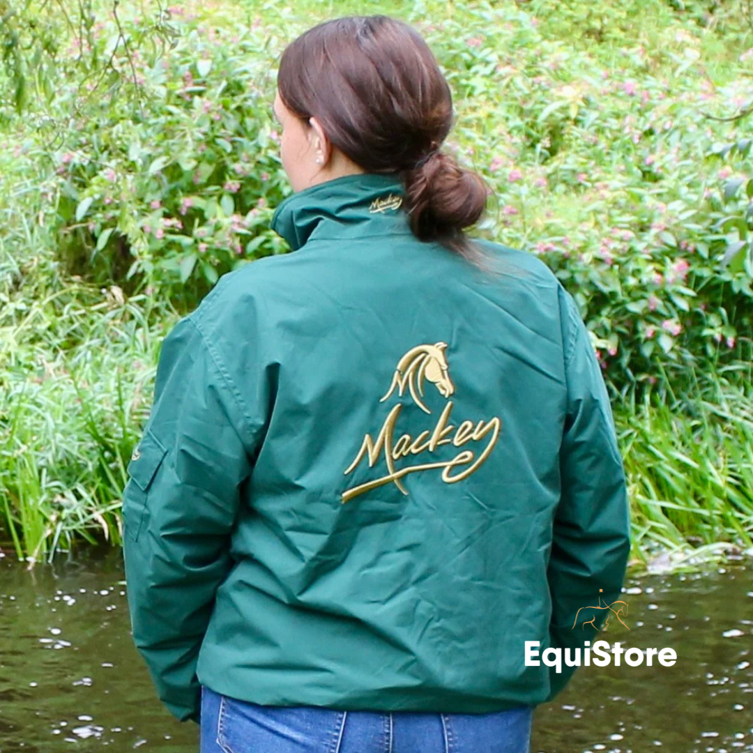 Mackey horse riding jacket, blouson style in green with large logo on back